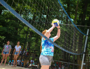 A girl hitting a volleyball