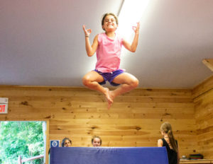 a girl mid-jump